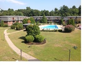 Millis apartment for rent - an aerial view of a backyard with a swimming pool