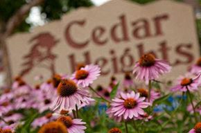 Omaha apartment for rent - a bunch of pink flowers in front of a sign