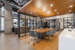 Portland apartment for rent - a large conference room with a table and chairs and a kitchen