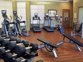 Courtney downs apartments fitness center and playroom
