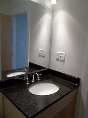 Suffolk apartment for rent - a bathroom with a sink and a mirror