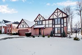 Depew house for rent - the front of a house with snow on the ground