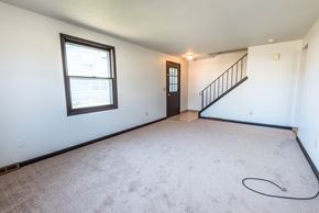 Amherst triplex for rent - the living room is empty and ready for us to move in to our new home