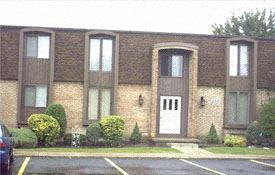 Amherst condo for rent - a large brick building with a white door and windows