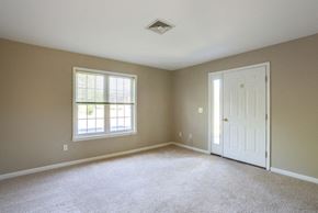 Getzville apartment for rent - Stonington Park Apartments – Living Room – Getzville Area – Appliances Included - 24 Hour Emergency Maintenance – Fireplace - Balcony – Carpeting - Pet Friendly - Garages – Ask for a Tour - Basic FIOS