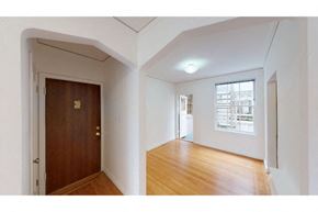 San Francisco apartment for rent - an empty room with a wooden floor and a door