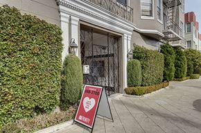 San Francisco apartment for rent - a sign in front of a building with a heart on it