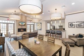 Lancaster apartment for rent - A modern dining room with a wooden table and chairs.