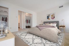 Philadelphia apartment for rent - a bedroom with a bed and a closet