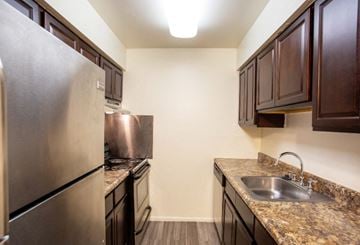 Lindenwold apartment for rent - A kitchen with a granite counter top and stainless steel appliances.