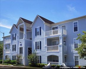 Gainesville apartment for rent - a large white building with a street in front of it