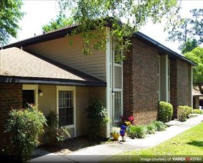 Gainesville apartment for rent - a small house with a sidewalk in front of it