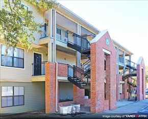 Tallahassee apartment for rent - a building with stairs on the side of it