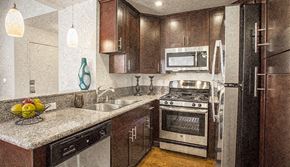 Simi Valley apartment for rent - a kitchen with a sink and a stove and a microwave