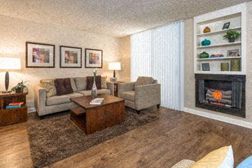 Los Angeles apartment for rent - a living room with furniture and a fireplace