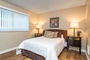 Los Angeles apartment for rent - a bedroom with a bed and two lamps