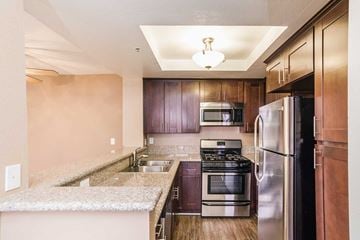 Los Angeles apartment for rent - a kitchen with stainless steel appliances and a granite counter top