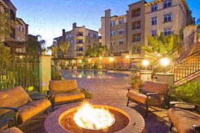 Los Angeles apartment for rent - a backyard with a fire pit and a swimming pool