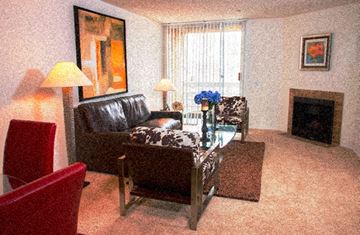 Los Angeles apartment for rent - a living room with leather furniture and a fireplace