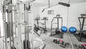 West Hollywood apartment for rent - a gym with a lot of equipment in it