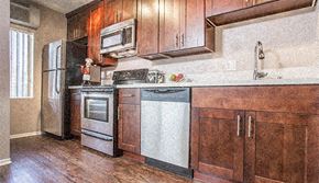 West Hollywood apartment for rent - a kitchen with a stove sink and refrigerator