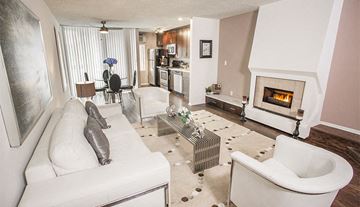 West Hollywood apartment for rent - a living room with a white couch and a fireplace