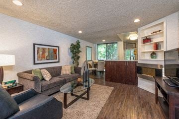 West Hollywood apartment for rent - a living room with a couch and a table