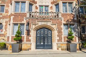 New Haven apartment for rent - the front of a brick building with a blue door