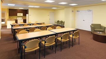 Montclair apartment for rent - a dining room with tables and chairs and a kitchen