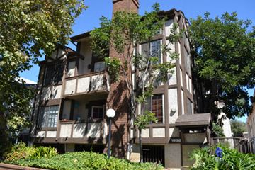 Los Angeles apartment for rent - an apartment building with trees in front of it