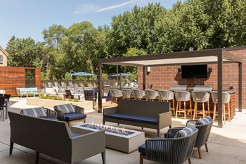 Outdoor grill with intimate seating area