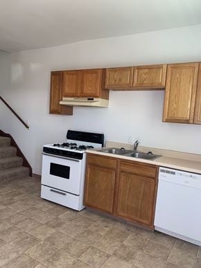 Glassport house for rent - an empty kitchen with a stove and a sink