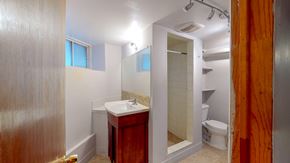 Ottawa apartment for rent - a bathroom with a sink toilet and a shower