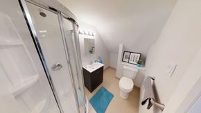 Ottawa apartment for rent - a bathroom with a shower and a toilet and a sink