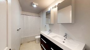 Ottawa apartment for rent - a bathroom with a sink and a toilet