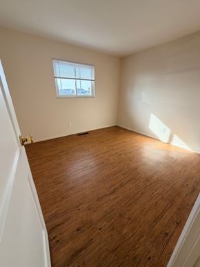 Hilliard apartment for rent - A room with wooden flooring and a window.
