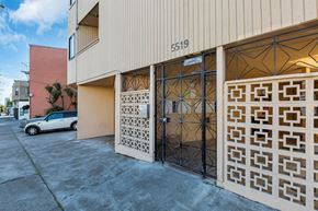 San Francisco apartment for rent - the side of a building with a car parked in front of it