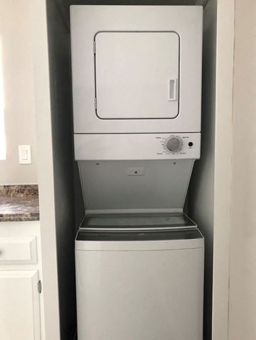 Redondo Beach apartment for rent - A white dishwasher is sitting in a kitchen.