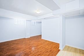 Ottawa apartment for rent - an empty room with blue walls and a wood floor