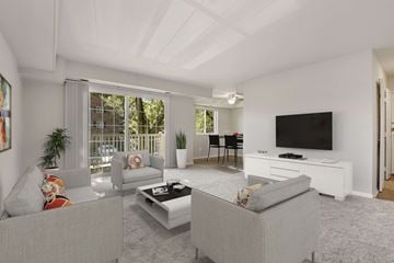 Forestville apartment for rent - a white living room with couches and a television