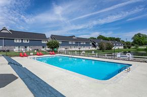 Nashville apartment for rent - a swimming pool with a house in the background