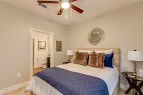 Savannah apartment for rent - a bedroom with a bed and a ceiling fan