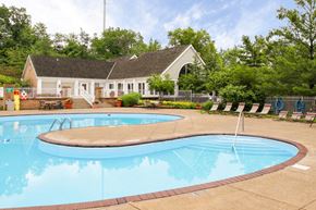 North Royalton apartment for rent - a swimming pool with a house in the background