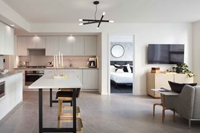 Seattle apartment for rent - A modern kitchen with a dining table and chairs.