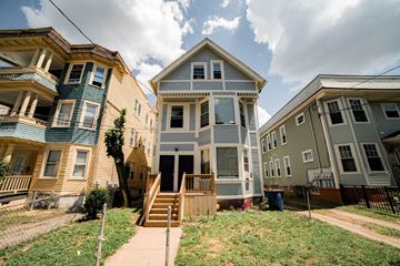 New Haven apartment for rent - three houses with stairs in front of a yard