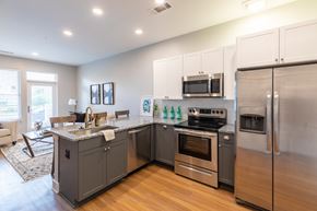Savannah apartment for rent - a kitchen with stainless steel appliances and a granite counter top
