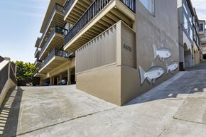 San Francisco apartment for rent - A building with a mural of fish on the side.