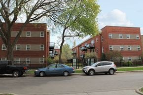 Chicago apartment for rent - two cars parked in front of an apartment building
