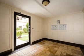 Chicago apartment for rent - the living room of the house has a door to the yard