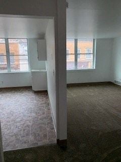 Glassport apartment for rent - A room with a carpeted floor and a window.